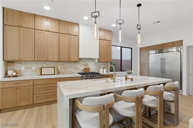 Nestled in guard-gated Eagle Rock community, this stunning home on TPC Las Vegas in Nevada - for sale on GolfHomes.com, golf home, golf lot