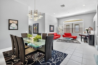 Experience lakefront living at it finest in this immaculate on Gleneagles Golf and Country Club in Florida - for sale on GolfHomes.com, golf home, golf lot