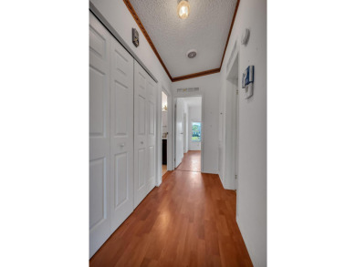 Enjoy stunning lakefront views from this beautiful TRIPLE-wide on Savanna Golf Club in Florida - for sale on GolfHomes.com, golf home, golf lot