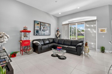 Experience lakefront living at it finest in this immaculate on Gleneagles Golf and Country Club in Florida - for sale on GolfHomes.com, golf home, golf lot