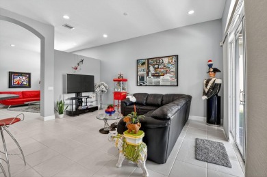 Experience lakefront living at it finest in this immaculate on Gleneagles Golf and Country Club in Florida - for sale on GolfHomes.com, golf home, golf lot