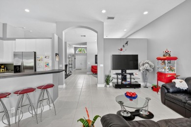 Experience lakefront living at it finest in this immaculate on Gleneagles Golf and Country Club in Florida - for sale on GolfHomes.com, golf home, golf lot