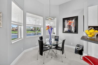 Experience lakefront living at it finest in this immaculate on Gleneagles Golf and Country Club in Florida - for sale on GolfHomes.com, golf home, golf lot