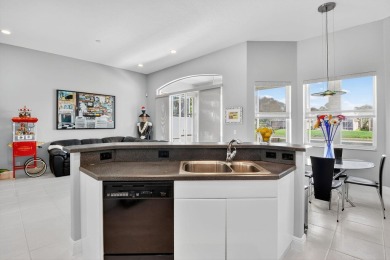 Experience lakefront living at it finest in this immaculate on Gleneagles Golf and Country Club in Florida - for sale on GolfHomes.com, golf home, golf lot