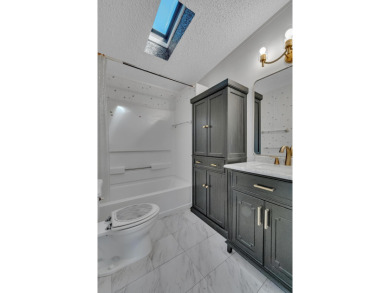 Enjoy stunning lakefront views from this beautiful TRIPLE-wide on Savanna Golf Club in Florida - for sale on GolfHomes.com, golf home, golf lot