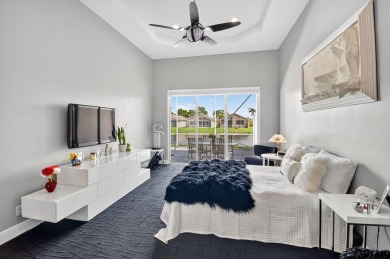Experience lakefront living at it finest in this immaculate on Gleneagles Golf and Country Club in Florida - for sale on GolfHomes.com, golf home, golf lot