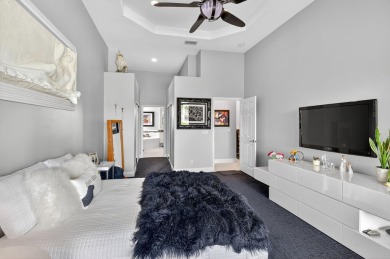 Experience lakefront living at it finest in this immaculate on Gleneagles Golf and Country Club in Florida - for sale on GolfHomes.com, golf home, golf lot
