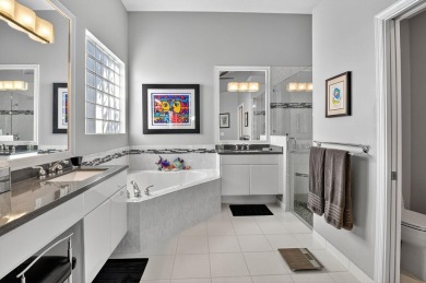 Experience lakefront living at it finest in this immaculate on Gleneagles Golf and Country Club in Florida - for sale on GolfHomes.com, golf home, golf lot