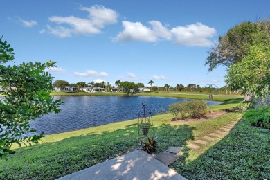Enjoy stunning lakefront views from this beautiful TRIPLE-wide on Savanna Golf Club in Florida - for sale on GolfHomes.com, golf home, golf lot