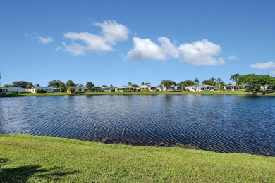 Enjoy stunning lakefront views from this beautiful TRIPLE-wide on Savanna Golf Club in Florida - for sale on GolfHomes.com, golf home, golf lot