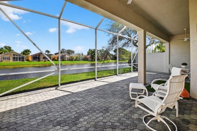 Experience lakefront living at it finest in this immaculate on Gleneagles Golf and Country Club in Florida - for sale on GolfHomes.com, golf home, golf lot