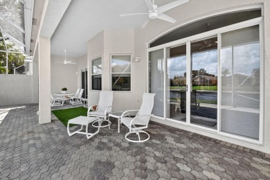 Experience lakefront living at it finest in this immaculate on Gleneagles Golf and Country Club in Florida - for sale on GolfHomes.com, golf home, golf lot