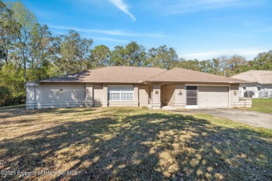 Discover the essence of Florida living in this charming on Oak Hills Country Club in Florida - for sale on GolfHomes.com, golf home, golf lot