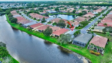 Experience lakefront living at it finest in this immaculate on Gleneagles Golf and Country Club in Florida - for sale on GolfHomes.com, golf home, golf lot
