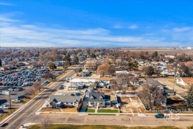 The well known White House with yellow door is completely on Fairview Golf Course in Idaho - for sale on GolfHomes.com, golf home, golf lot