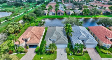 Experience lakefront living at it finest in this immaculate on Gleneagles Golf and Country Club in Florida - for sale on GolfHomes.com, golf home, golf lot