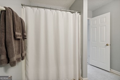 Striking modern home on the 6th green in the gated community of on The Club At Osprey Cove in Georgia - for sale on GolfHomes.com, golf home, golf lot