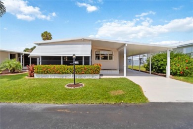 Welcome to a refined slice of paradise in the prestigious on Twin Isles Country Club in Florida - for sale on GolfHomes.com, golf home, golf lot