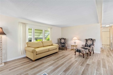 Welcome to a refined slice of paradise in the prestigious on Twin Isles Country Club in Florida - for sale on GolfHomes.com, golf home, golf lot