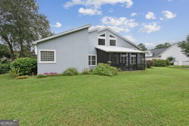 Striking modern home on the 6th green in the gated community of on The Club At Osprey Cove in Georgia - for sale on GolfHomes.com, golf home, golf lot