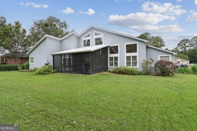 Striking modern home on the 6th green in the gated community of on The Club At Osprey Cove in Georgia - for sale on GolfHomes.com, golf home, golf lot