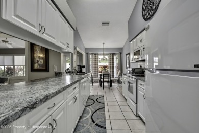 This beautiful Oakmont, turnkey villa is move-in ready, offering on Timber Pines Golf Course in Florida - for sale on GolfHomes.com, golf home, golf lot