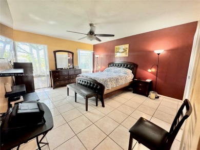 Seller is offering $10,000 towards buyer's closing costs with an on Country Club of Miami in Florida - for sale on GolfHomes.com, golf home, golf lot