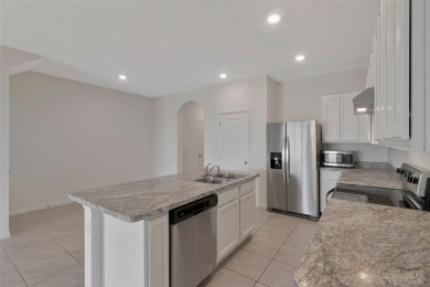 Welcome to this nearly brand-new waterfront townhouse located in on Ridgewood Lakes Golf and Country Club in Florida - for sale on GolfHomes.com, golf home, golf lot