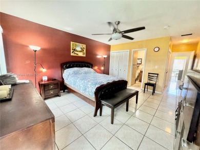 Seller is offering $10,000 towards buyer's closing costs with an on Country Club of Miami in Florida - for sale on GolfHomes.com, golf home, golf lot