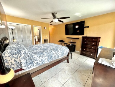 Seller is offering $10,000 towards buyer's closing costs with an on Country Club of Miami in Florida - for sale on GolfHomes.com, golf home, golf lot