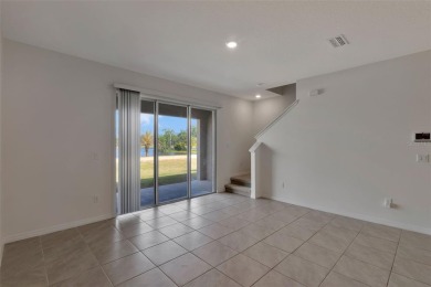 Welcome to this nearly brand-new waterfront townhouse located in on Ridgewood Lakes Golf and Country Club in Florida - for sale on GolfHomes.com, golf home, golf lot