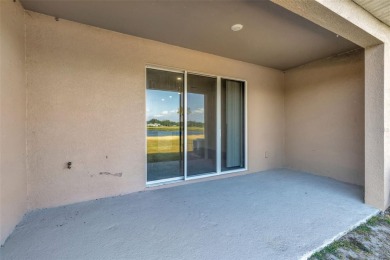 Welcome to this nearly brand-new waterfront townhouse located in on Ridgewood Lakes Golf and Country Club in Florida - for sale on GolfHomes.com, golf home, golf lot