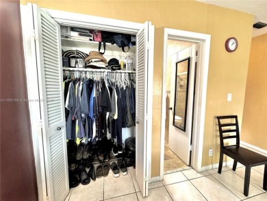 Seller is offering $10,000 towards buyer's closing costs with an on Country Club of Miami in Florida - for sale on GolfHomes.com, golf home, golf lot