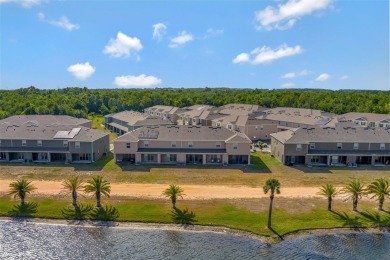 Welcome to this nearly brand-new waterfront townhouse located in on Ridgewood Lakes Golf and Country Club in Florida - for sale on GolfHomes.com, golf home, golf lot