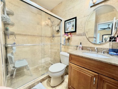 Seller is offering $10,000 towards buyer's closing costs with an on Country Club of Miami in Florida - for sale on GolfHomes.com, golf home, golf lot