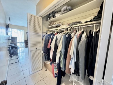 Seller is offering $10,000 towards buyer's closing costs with an on Country Club of Miami in Florida - for sale on GolfHomes.com, golf home, golf lot