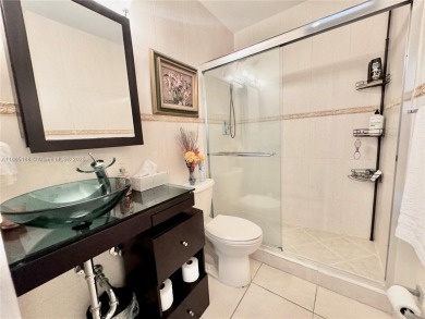 Seller is offering $10,000 towards buyer's closing costs with an on Country Club of Miami in Florida - for sale on GolfHomes.com, golf home, golf lot