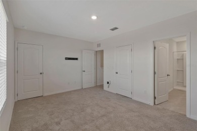 Welcome to this nearly brand-new waterfront townhouse located in on Ridgewood Lakes Golf and Country Club in Florida - for sale on GolfHomes.com, golf home, golf lot