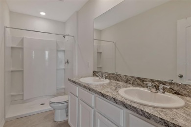 Welcome to this nearly brand-new waterfront townhouse located in on Ridgewood Lakes Golf and Country Club in Florida - for sale on GolfHomes.com, golf home, golf lot