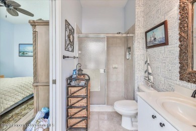 Paradise calls - will you be the one who answers? An exquisite on Silverthorn Country Club in Florida - for sale on GolfHomes.com, golf home, golf lot