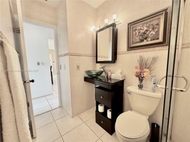 Seller is offering $10,000 towards buyer's closing costs with an on Country Club of Miami in Florida - for sale on GolfHomes.com, golf home, golf lot