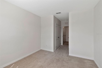 Welcome to this nearly brand-new waterfront townhouse located in on Ridgewood Lakes Golf and Country Club in Florida - for sale on GolfHomes.com, golf home, golf lot