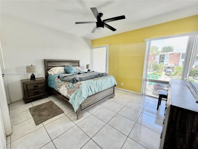 Seller is offering $10,000 towards buyer's closing costs with an on Country Club of Miami in Florida - for sale on GolfHomes.com, golf home, golf lot