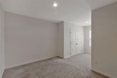 Welcome to this nearly brand-new waterfront townhouse located in on Ridgewood Lakes Golf and Country Club in Florida - for sale on GolfHomes.com, golf home, golf lot