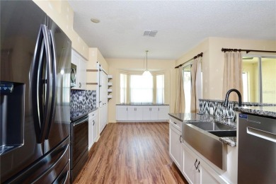 Welcome to 127 Club Villas Drive, a charming single-story on Remington Golf Club in Florida - for sale on GolfHomes.com, golf home, golf lot