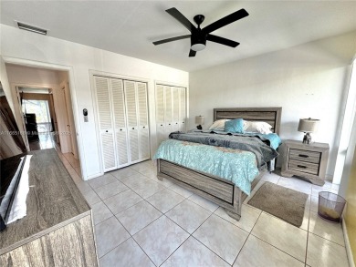 Seller is offering $10,000 towards buyer's closing costs with an on Country Club of Miami in Florida - for sale on GolfHomes.com, golf home, golf lot