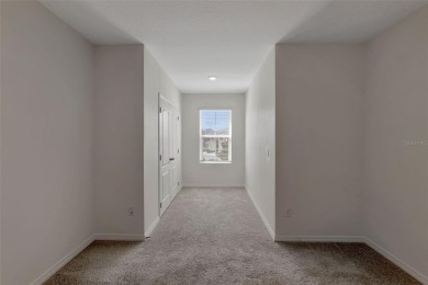 Welcome to this nearly brand-new waterfront townhouse located in on Ridgewood Lakes Golf and Country Club in Florida - for sale on GolfHomes.com, golf home, golf lot