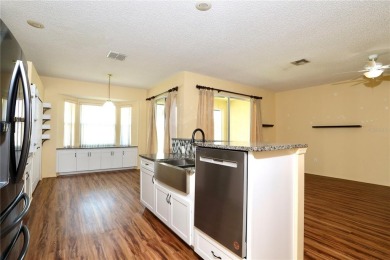 Welcome to 127 Club Villas Drive, a charming single-story on Remington Golf Club in Florida - for sale on GolfHomes.com, golf home, golf lot