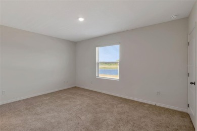 Welcome to this nearly brand-new waterfront townhouse located in on Ridgewood Lakes Golf and Country Club in Florida - for sale on GolfHomes.com, golf home, golf lot