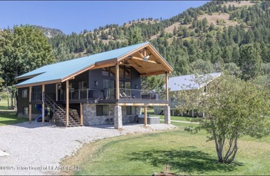 Discover elevated mountain living in this stunning 6-bedroom on Star Valley RV Golf Course in Wyoming - for sale on GolfHomes.com, golf home, golf lot